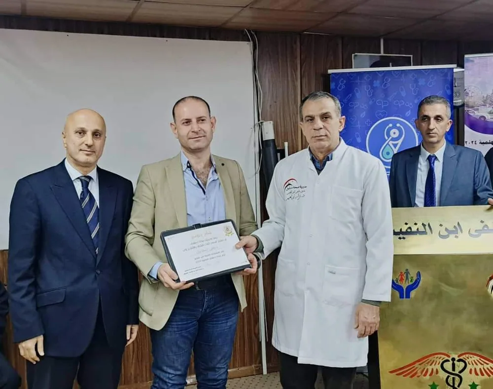 الدكتور رامي اسماعيل خلال مناسبة تكريم مهنية
